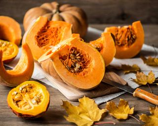 pumpkins cut open with knife