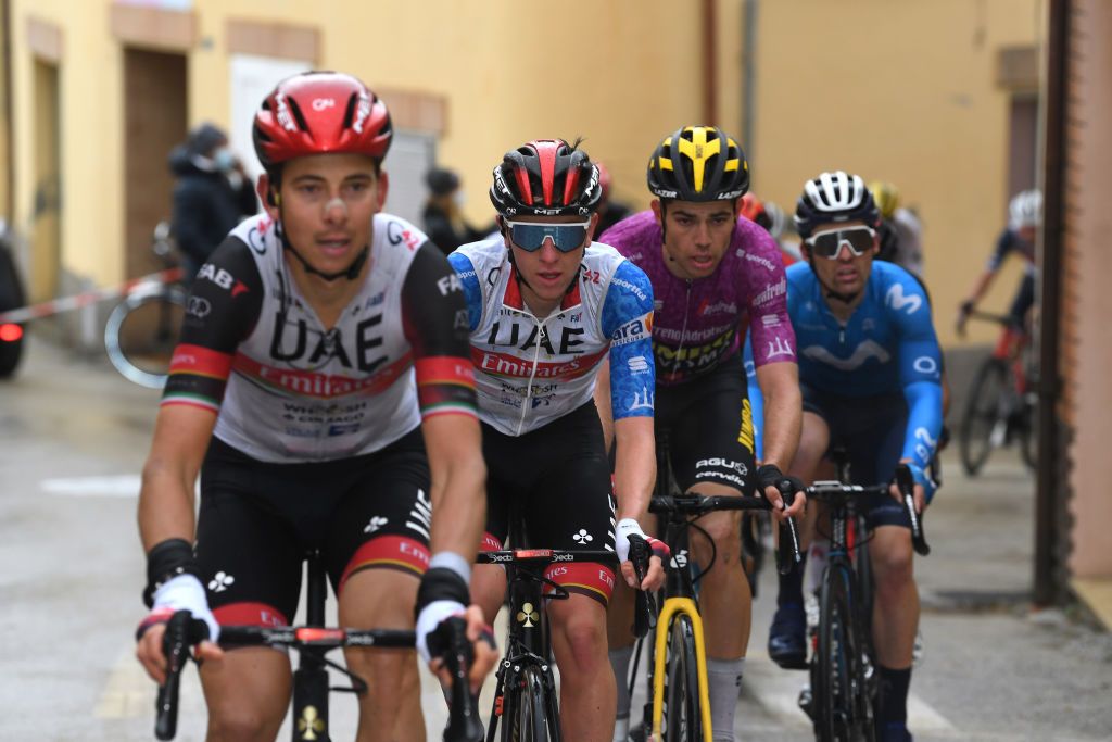 CASTELFIDARDO ITALY MARCH 14 Davide Formolo of Italy and UAE Team Emirates Tadej Pogacar of Slovenia and UAE Team Emirates Blue Leader Jersey Wout Van Aert of Belgium and Team Jumbo Visma Purple Sprint Jersey during the 56th TirrenoAdriatico 2021 Stage 5 a 205km stage from Castellalto to Castelfidardo 175m TirrenoAdriatico on March 14 2021 in Castelfidardo Italy Photo by Tim de WaeleGetty Images