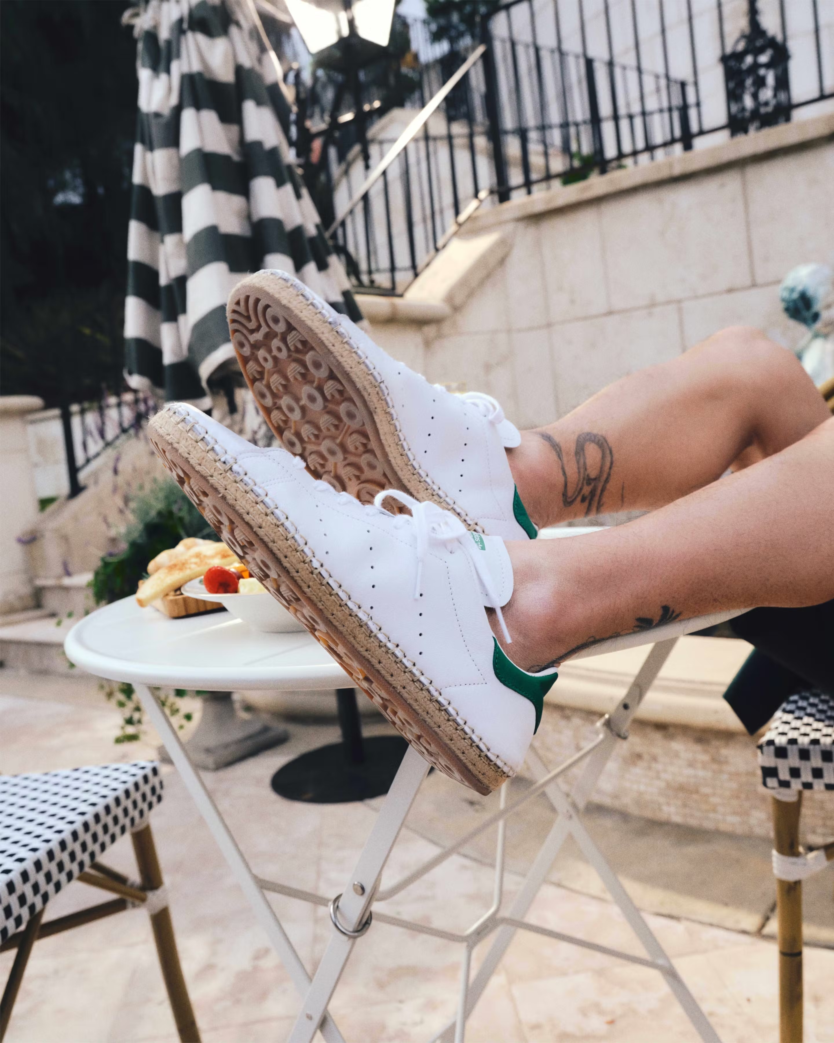 Lifetstyle shots of the new Stan Smith espadrilles made with CLOT