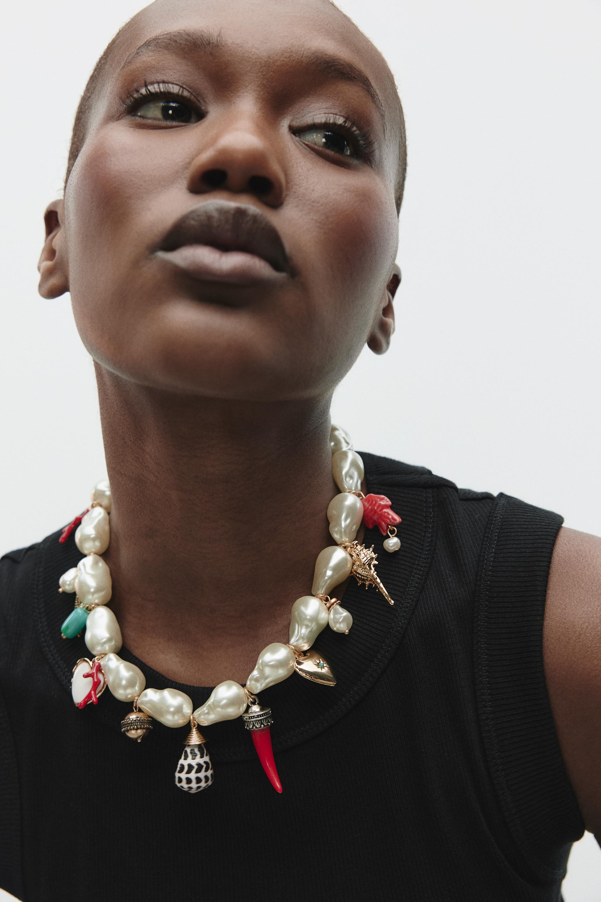 Charm and Pearl Necklace