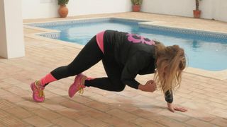 Christianne Wolff demonstrates mountain climbers