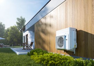 air source heat pump on outside of a home