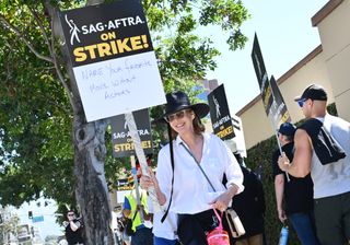 Allison Janney pickets during the SAG-AFTRA strike