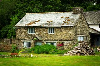 A period stone cottage in a countryside setting