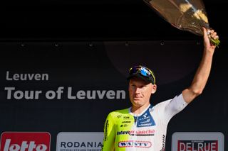 Mike Teunissen on the podium of the Tour of Leuven