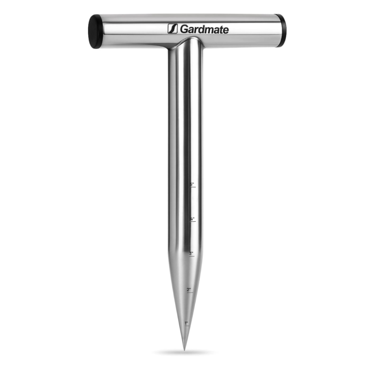 a metal t-shaped tool designed to poke holes into soil for planting