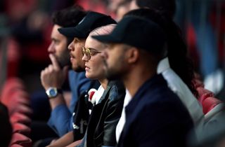 Pop star Anne-Marie watches on at Wembley