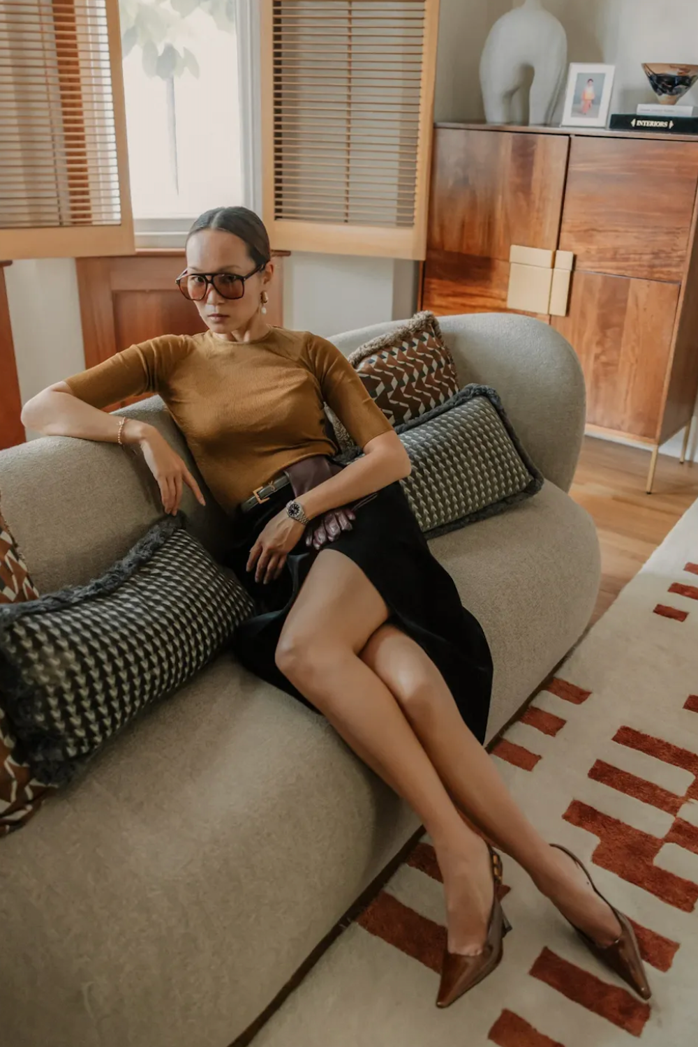 @marikokuo wears brown stilettos brown skirt and top