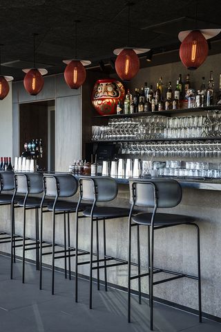 Restaurant with a bar counter and chairs
