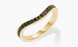Rebus ring with yellow gold and blue sapphires