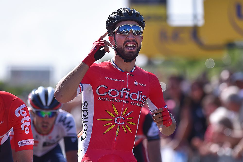 Nacer Bouhanni celebrates winning Criterium du Dauphine's first stage.