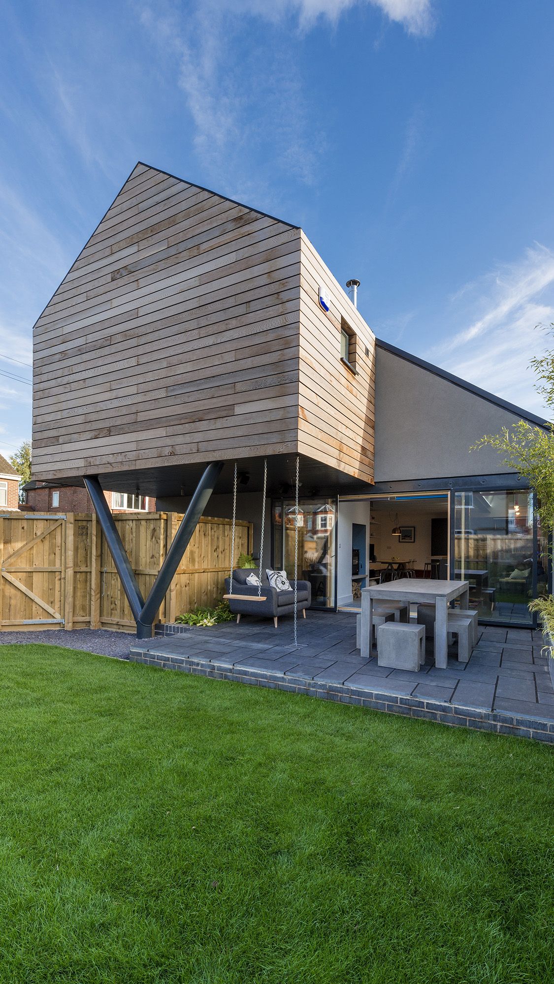 timber clad self build home with cantilever section