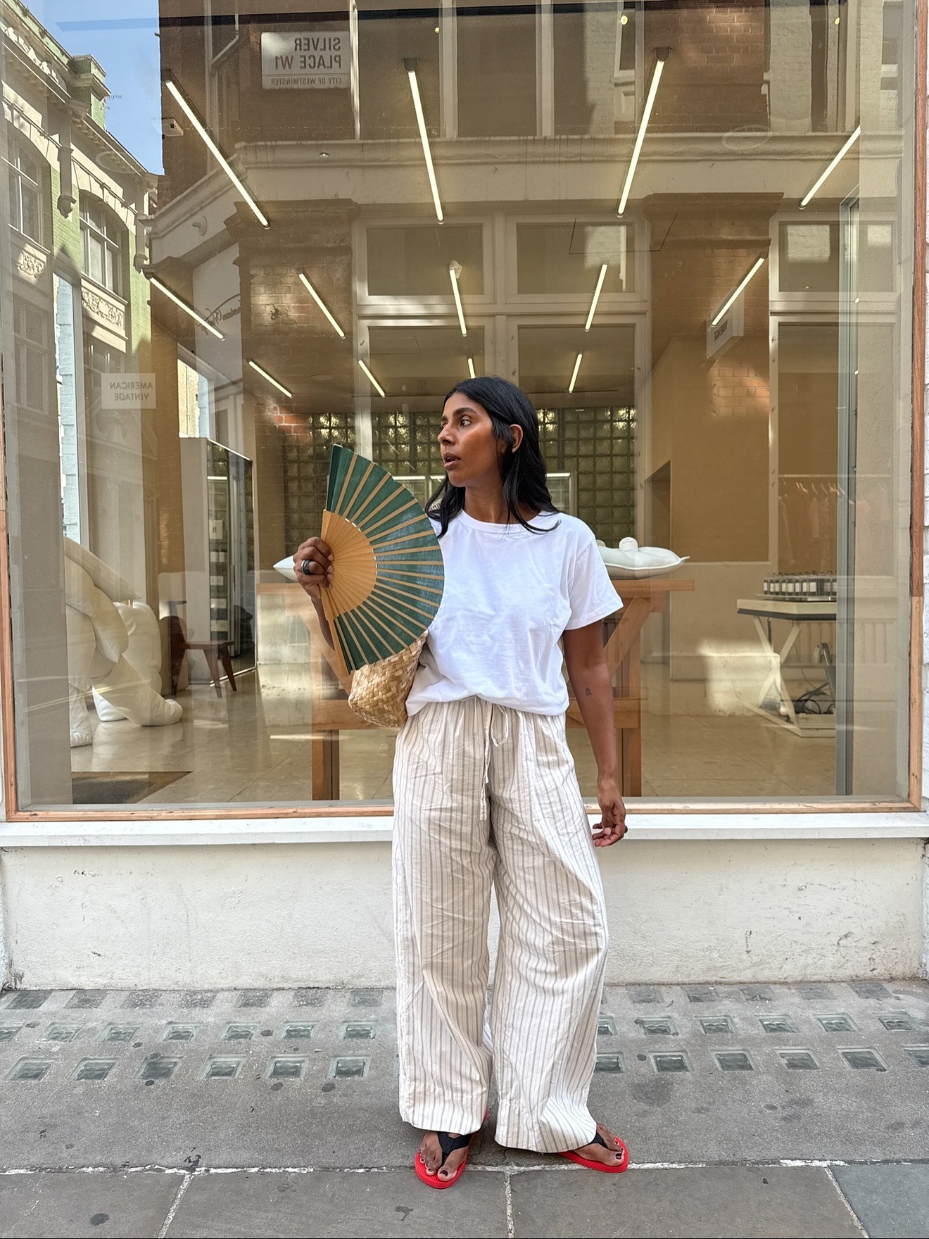 @monikh wearing drawstring pants and a crewneck