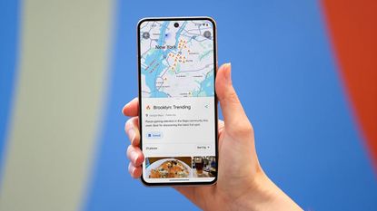 Google Maps on a phone being held in someone's hand