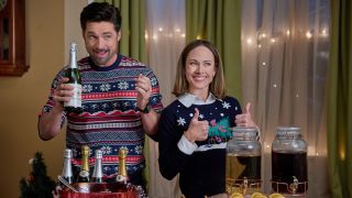 Warren Christie and Nikki DeLoach star in Our Holiday Story.