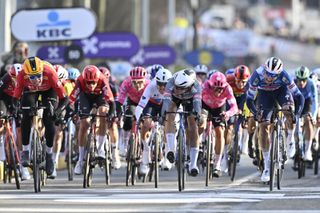 Norwegian Soren Waerenskjold of Uno-X Mobility, Belgian Jasper Philipsen of Alpecin-Deceuninck and French Paul Magnier of Soudal Quick-Step sprint to the finish of the men's one-day cycling race Omloop Het Nieuwsblad (UCI World Tour), 197km from Gent to Ninove, Saturday 01 March 2025. BELGA PHOTO DIRK WAEM (Photo by DIRK WAEM / BELGA MAG / Belga via AFP) (Photo by DIRK WAEM/BELGA MAG/AFP via Getty Images)