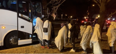 Migrants boarding a bus in Washington, D.C. 
