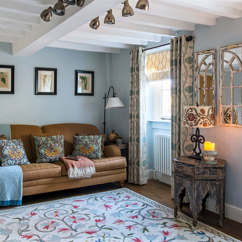 living room with wooden floor and sofa