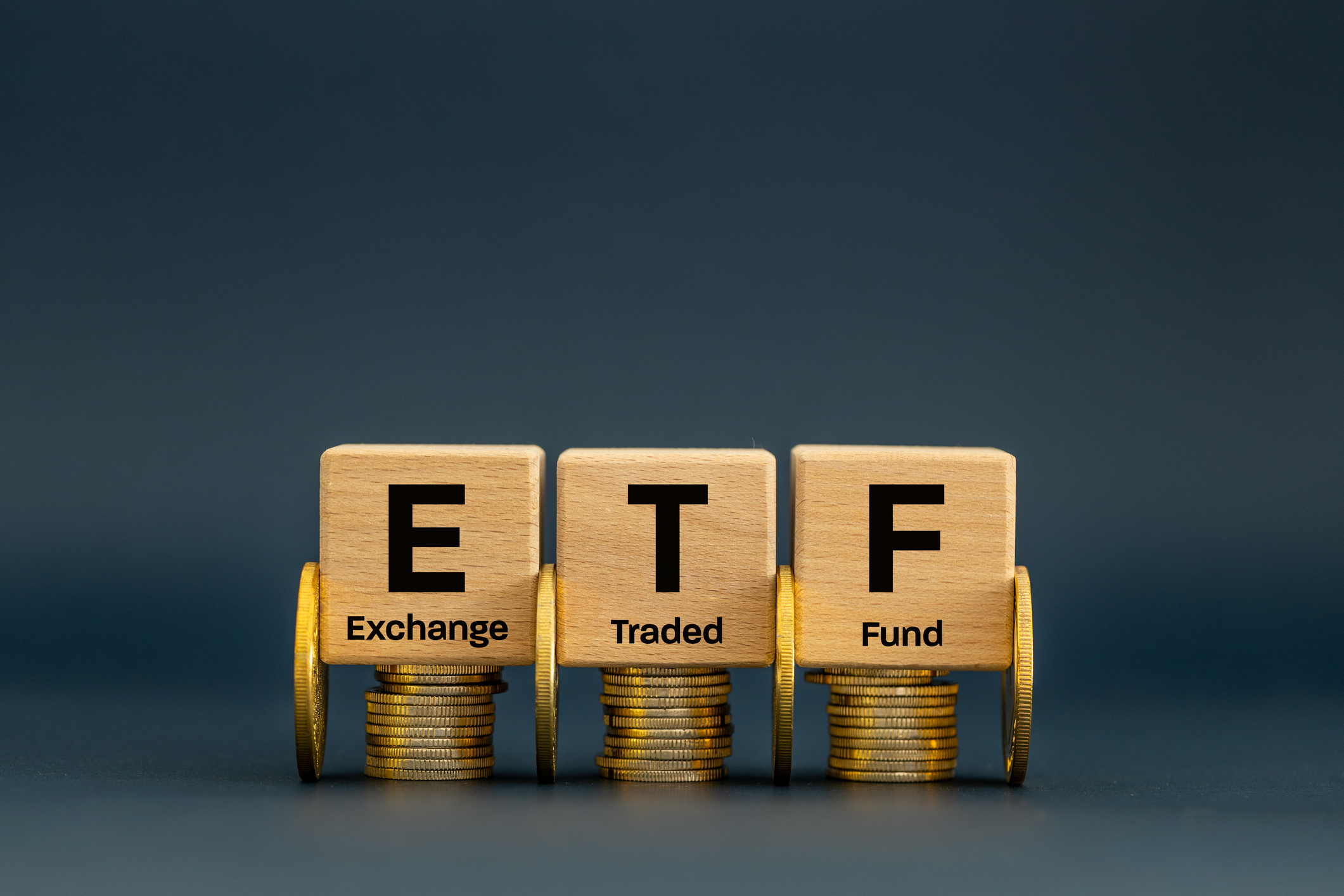 ETF exchange traded fund on wood blocks
