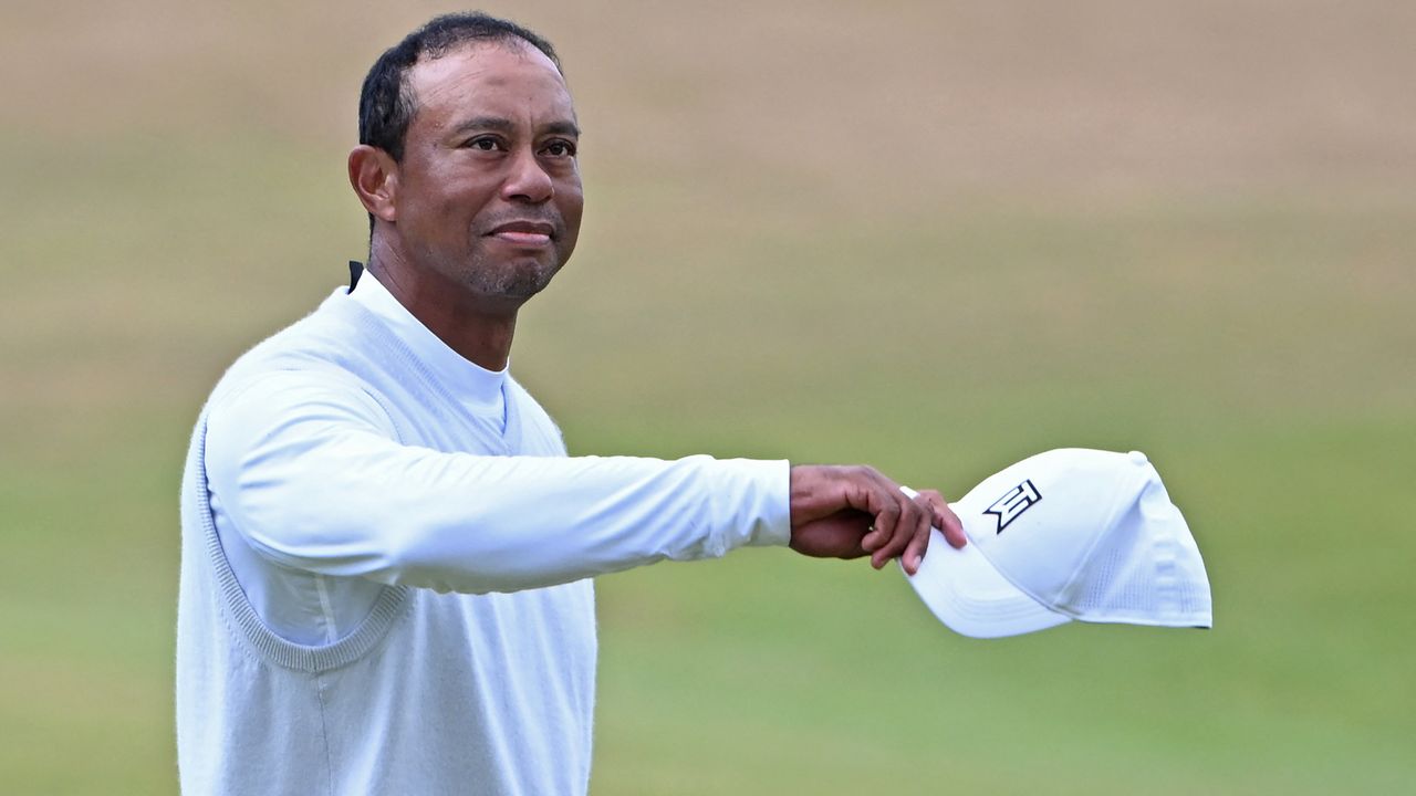 Tiger Woods acknowledges the crowd after his second round at the 150th Open