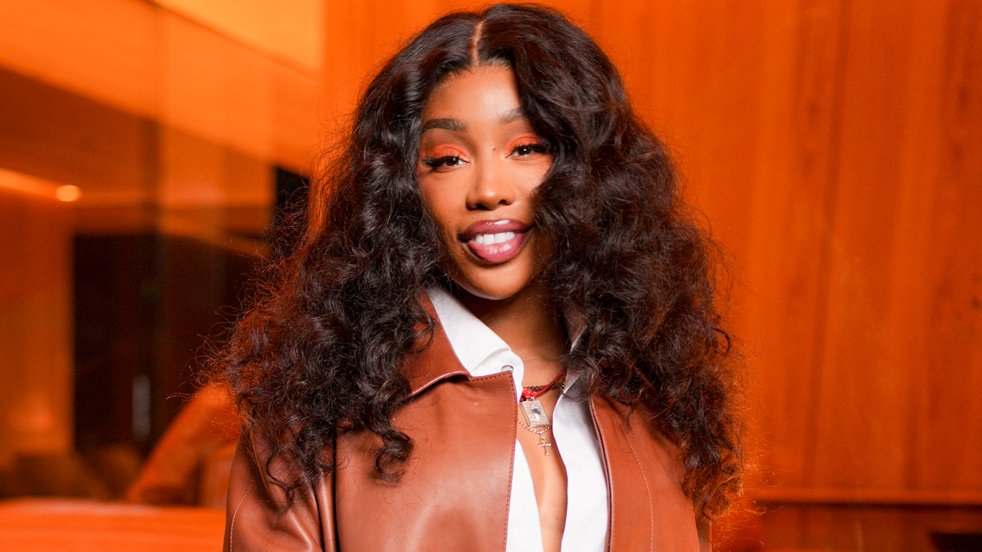 SZA attended the Louis Vuitton menswear show in custom Vans sneakers