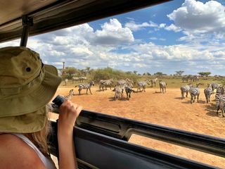 Side View Of Woman Doing Safari