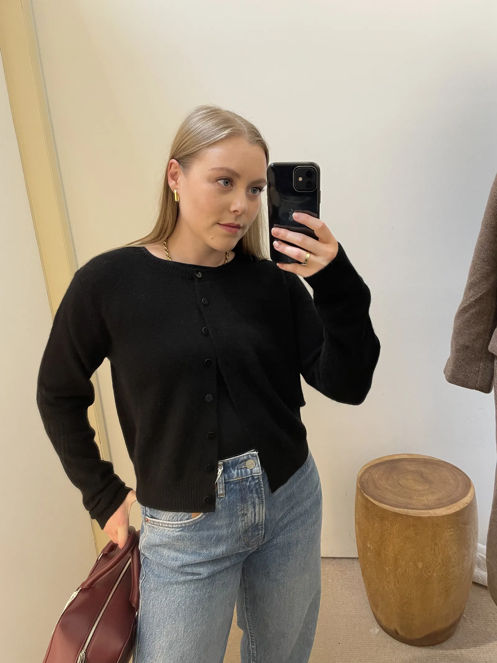 Florrie wearing the Clara cashmere cardigan