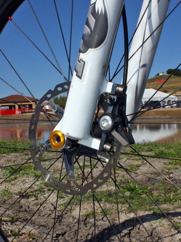 Kabush says he and team mechanic Gary Wolff are experimenting with 'NASCAR-style' wheel changes using a custom 15mm thru-axle.