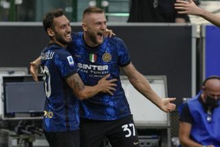 Inter Milan’s Milan Skriniar (right) celebrates scoring