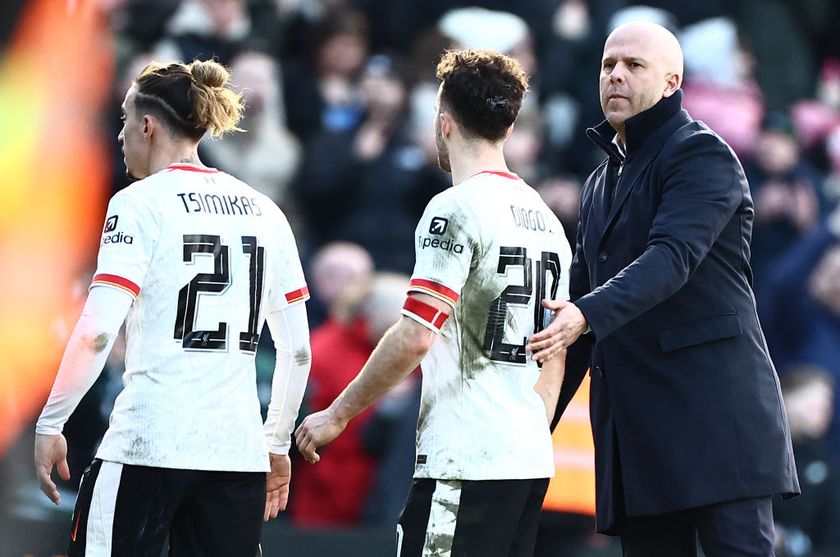 Liverpool&#039;s Dutch manager Arne Slot (R) commiserates Liverpool&#039;s Portuguese striker #20 Diogo Jota after the English FA Cup fourth round football match between Plymouth Argyle and Liverpool at Home Park in Plymouth, south west England, on February 9, 2025. Plymouth won the match 1-0. (Photo by HENRY NICHOLLS / AFP) / RESTRICTED TO EDITORIAL USE. No use with unauthorized audio, video, data, fixture lists, club/league logos or &#039;live&#039; services. Online in-match use limited to 120 images. An additional 40 images may be used in extra time. No video emulation. Social media in-match use limited to 120 images. An additional 40 images may be used in extra time. No use in betting publications, games or single club/league/player publications. / (Photo by HENRY NICHOLLS/AFP via Getty Images)