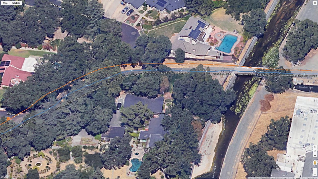 A Google Earth satellite map showing two GPS lines for the Suunto Race 2 and Garmin Venu X1 for the same run, showing how accurate they are.