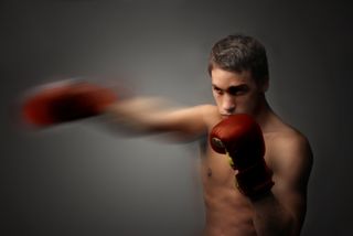 A boxer punching.