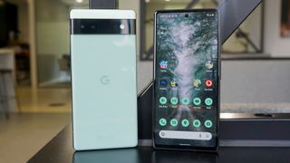 Two Google Pixel 6a phones on a table