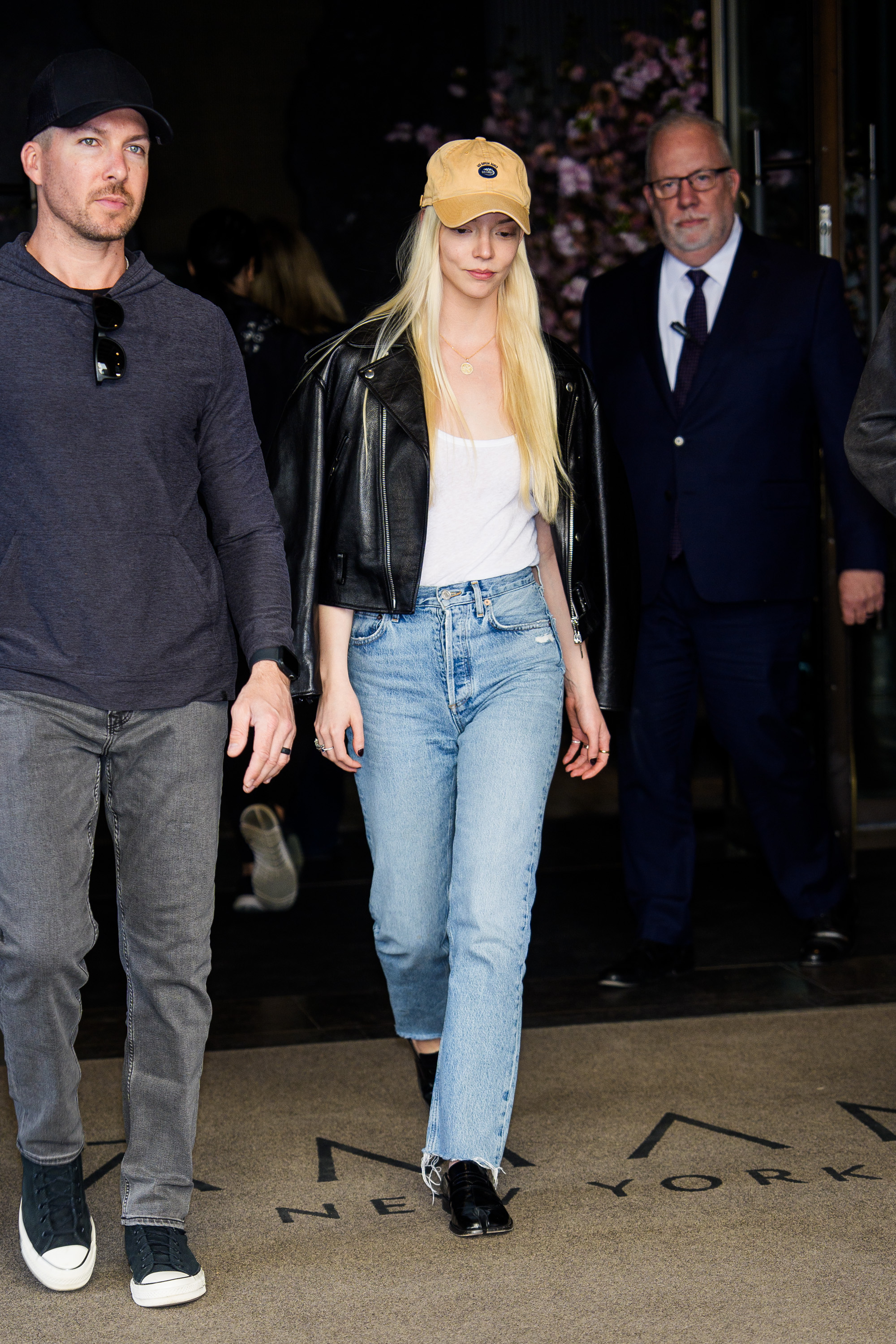 Anya Taylor-Joy styles Tabi loafers with straight leg jeans.