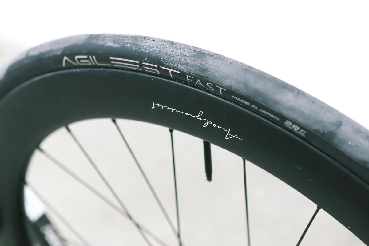 a close up of a black road bike tyre