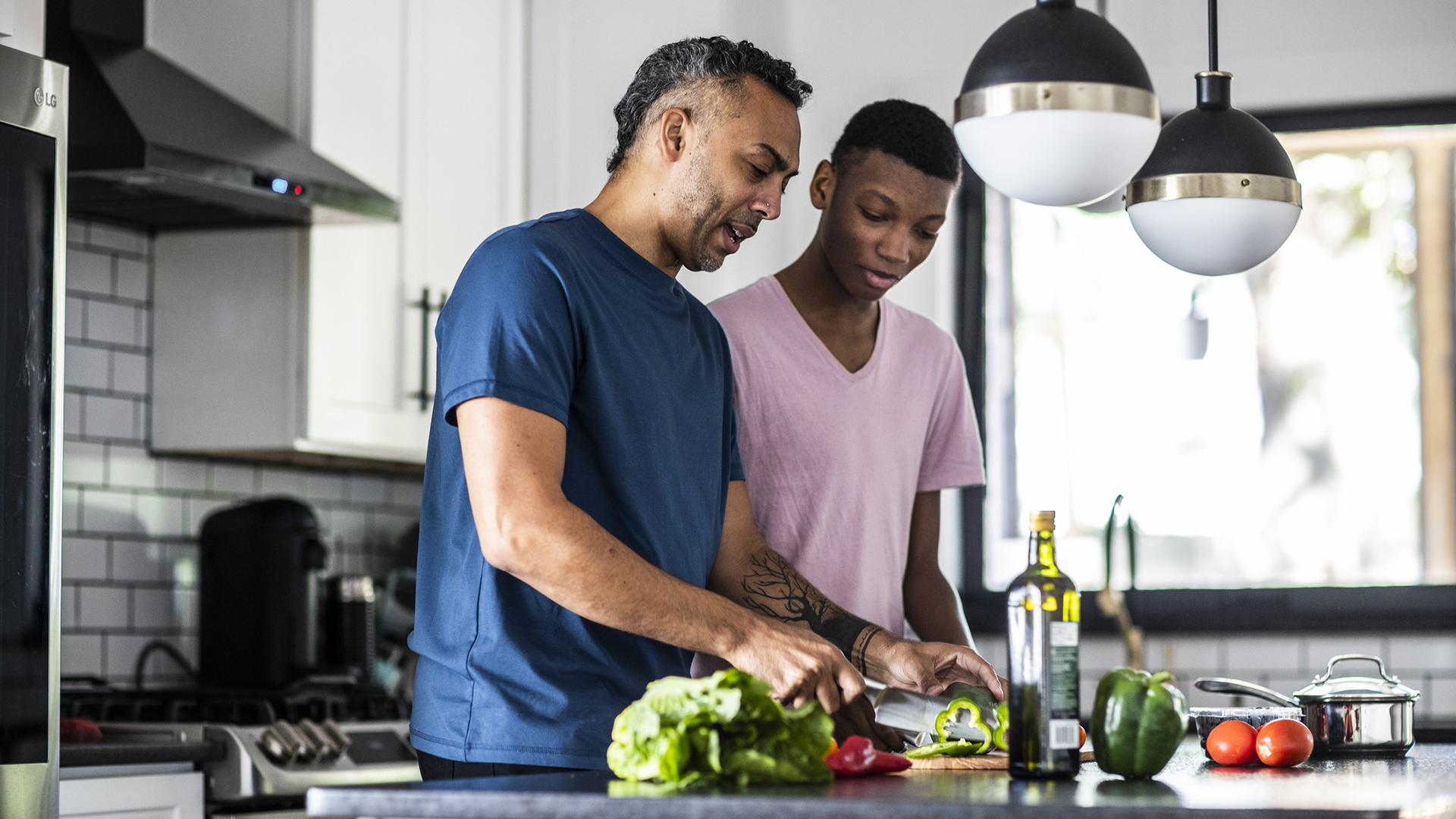 men cooking in the kitchen