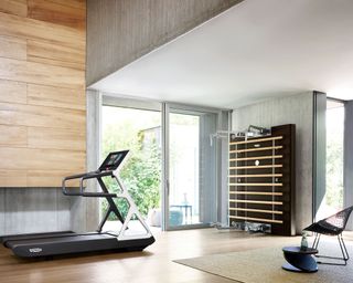 Home gym ideas with treadmill and wood panels