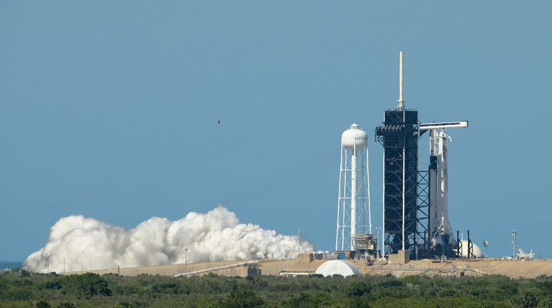 The SpaceX Falcon 9 rocket that will launch the Demo-2 mission on May 27, 2020, undergoes a &quot;static fire&quot; test at NASA&#039;s Kennedy Space Center in Florida on May 22, 2020.