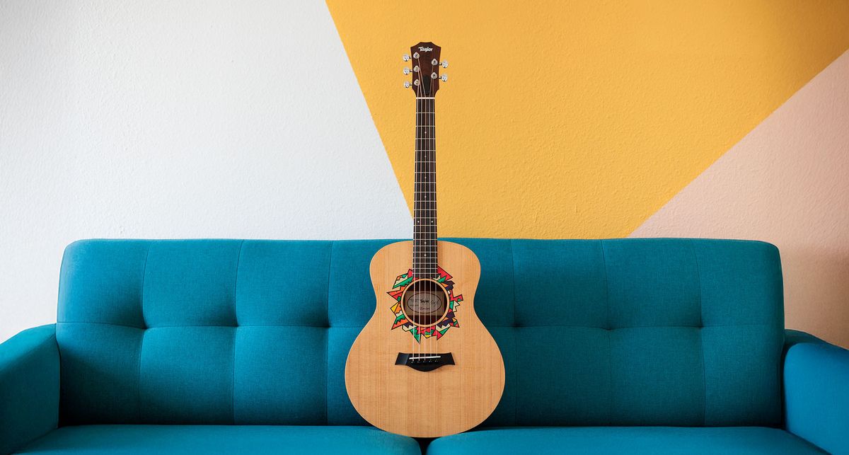 Taylor Jacob Collier GS Mini: featuring a brightly-coloured rosette graphic designed with the musical polymath, this beginner friendly acoustic has a bold five-string design for his signature DAEAD tuning.