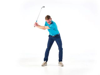 Golf Monthly Top 50 Coach Tom Motley demonstrating the correct technique for the transition of the golf swing