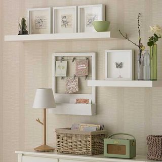 room with frame shelves and lamp