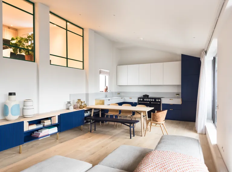 open plan kitchen and living room cabinetry