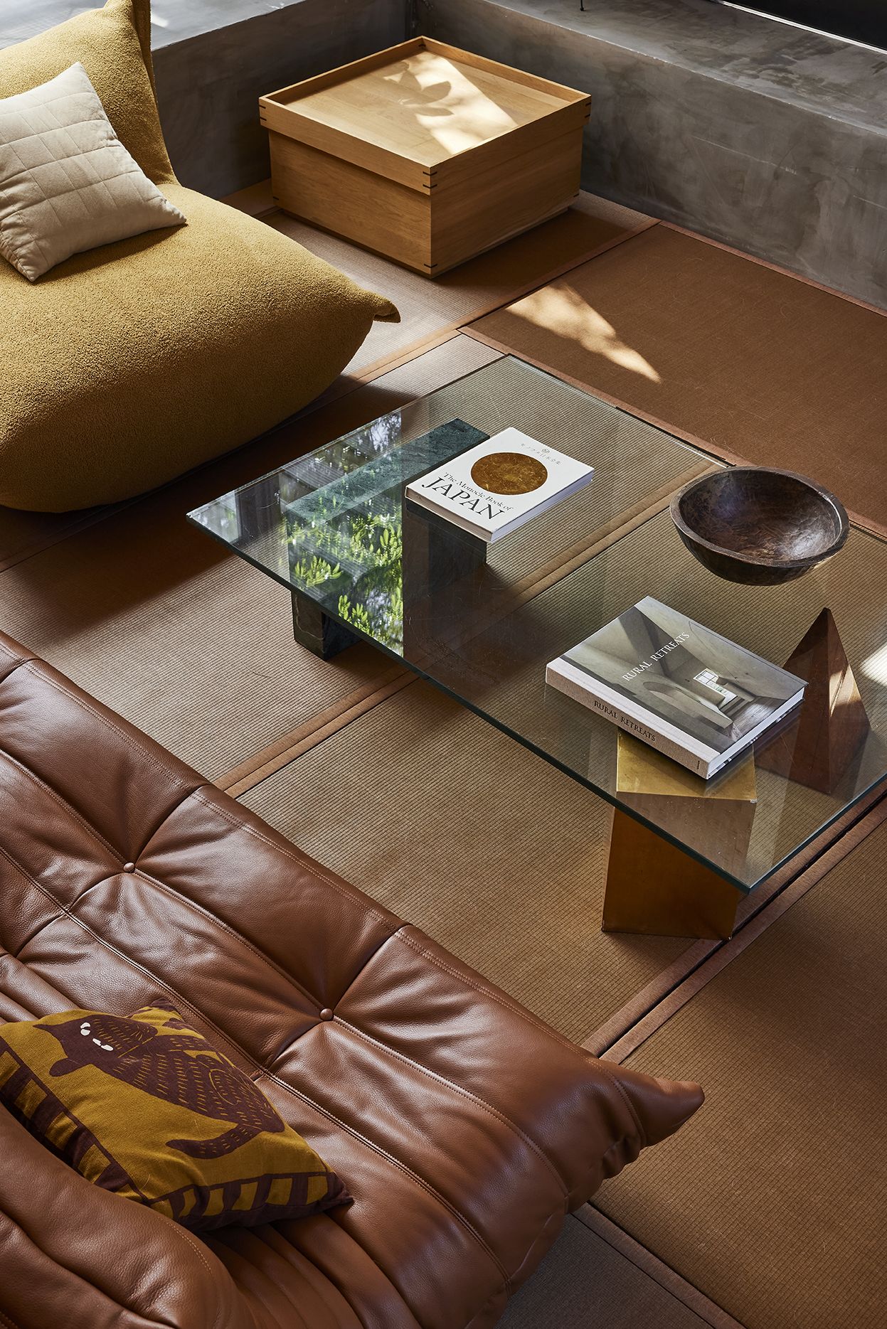 The sunken tatami lounge reinterprets a traditional Japanese gathering space, fostering moments of connection, contemplation, and everyday ritual.