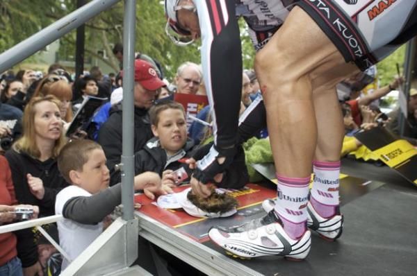 Young fans enjoy the chance to meet the racers.