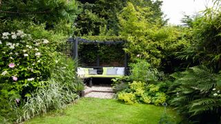 Narrow garden with a nook in its end corner