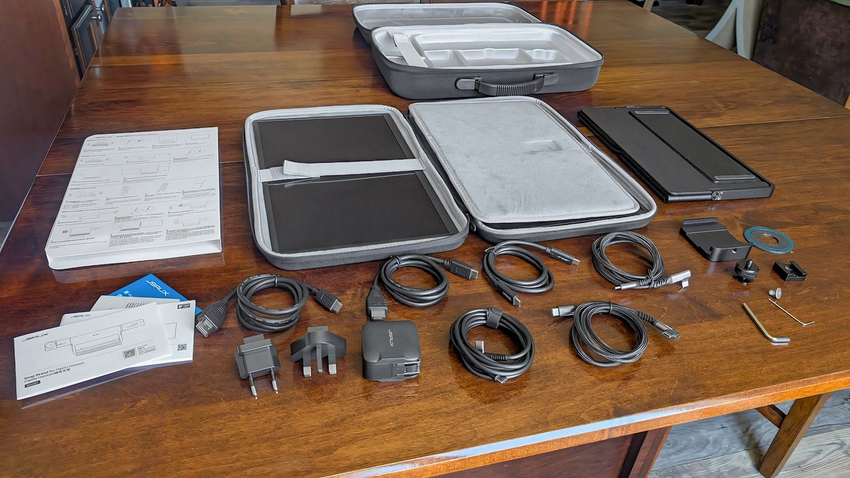 The USB-C cables, mini HDMI cables, universal adapter, manuals, hex keys, Snap Stand Pro, monitor hard shell case, stand instructions, and larger hard shell case for the JSAUX FlipGo Horizon Pro.