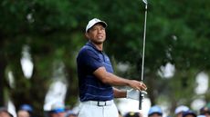 Tiger Woods plays his tee shot on the fourth hole during the second round of the 2023 Masters Tournament at Augusta National Golf Club