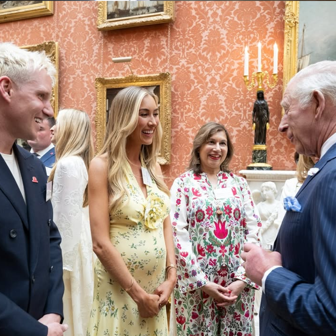 Jamie Laing and Sophie Habboo talking to King Charles at Buckingham Palace