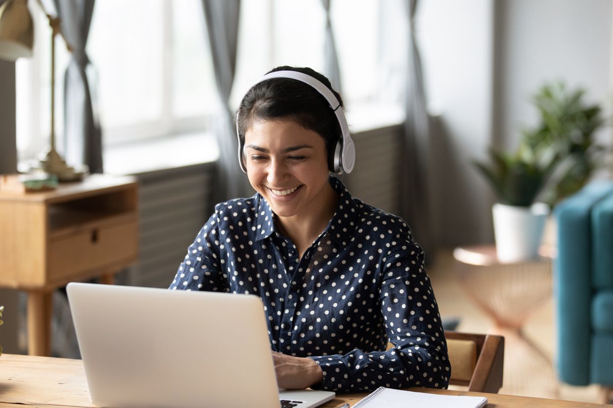 A woman receives virtual tutoring.