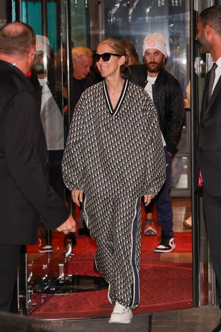 celine dion wearing a dior tracksuit to the Prelude to the Olympics party